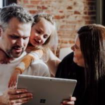 photo of parents with young daughter