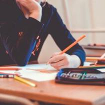 photo of teen student with pencil